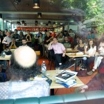 Logic Lounge at Heuer am Karlsplatz: Over a 100 guests enjoying the conversation between Christos Papadimitriou and Helmut Veith on the pancake stacking problem (as solved together with Bill Gates) and the nexus of sex and algorithms